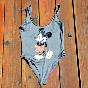 Disney one piece woman's body suit. SIZE M gray with Mickey Mouse on front.